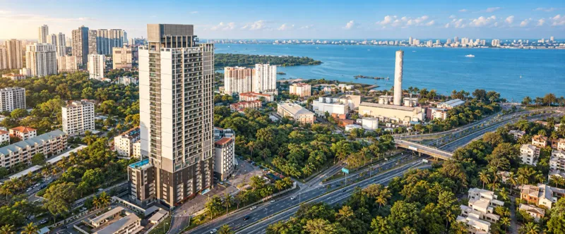 VOS Commercial Suites building facade — Completed tower aerial photograph from the supplied project material